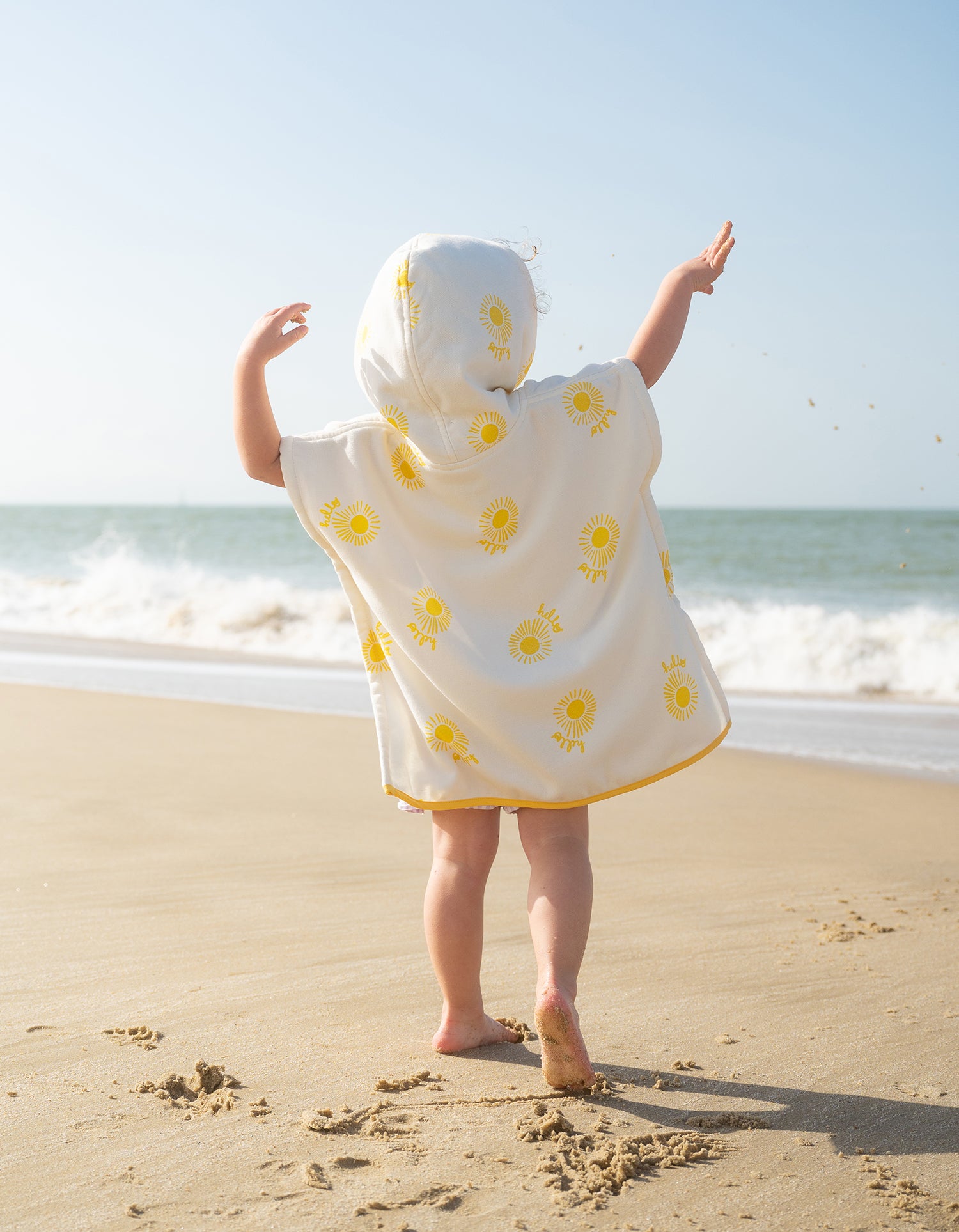 Kinderponcho mit Kapuze - Sonnen