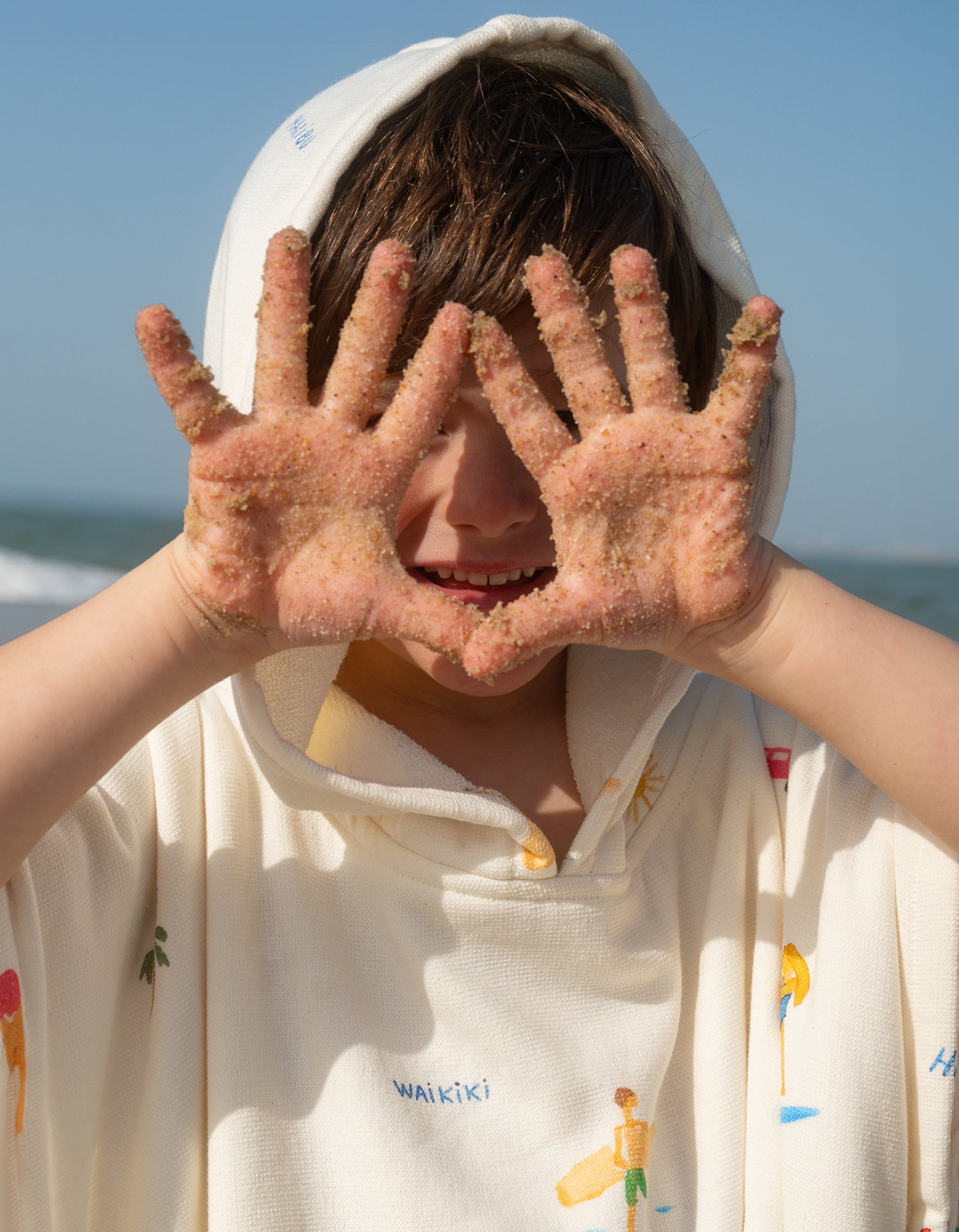Kinderponcho mit Kapuze - Surfer